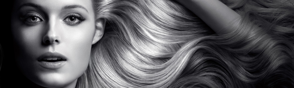 Prachtvolle lange Haare einer jungen Frau - Web-EDI Lösung für L'Oréal Österreich
